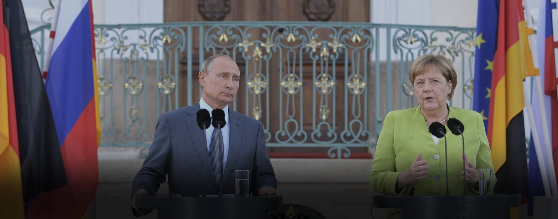 Путин и Меркель обсудили Ливию и Сирию